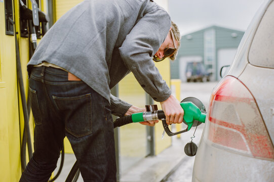 Man Pumping Gas