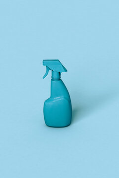 one Blue spray bottle on blue