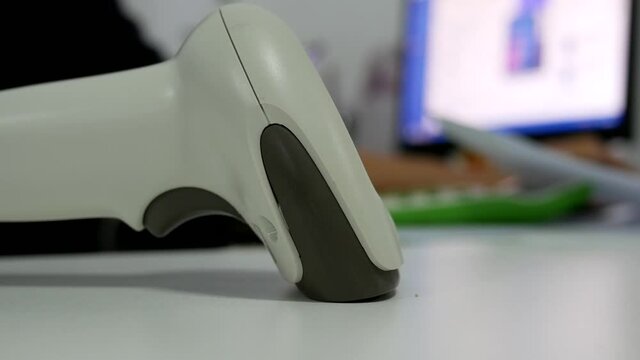 barcode scanner on the table in office.