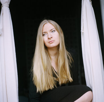A beautiful blond pensive woman
