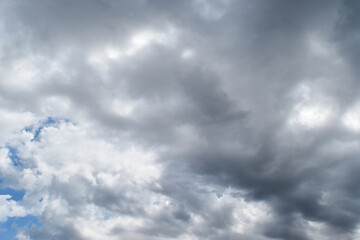 Cumulonimbus cloud formations on tropical sky , Nimbus moving , Abstract background from natural phenomenon and gray clouds hunk , Thailand	