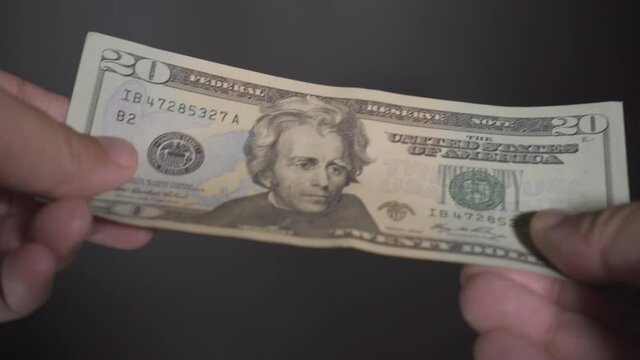4K Video US Dollar Banknote money from hand to hand. Concept for america economic and financial.
