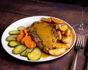 Appetizing piece of meat with mexican sauce