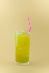 Fresh squeezed sugar cane juice and ice in glass