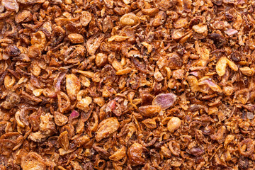 Golden brown and crispy deep fried shallots background