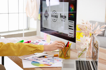 Female designer working in office