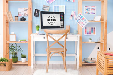 Comfortable workplace of graphic designer in office