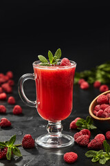 Refreshing cold berry tea with raspberry and mint