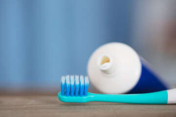 A toothbrush and a tube of toothpaste