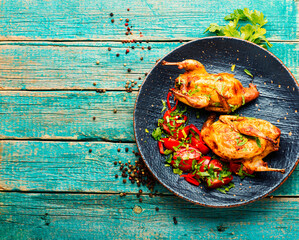 Baked quail and vegetable salad,copy space