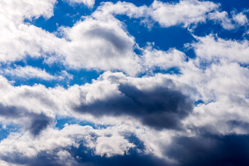 White fluffy clouds in the blue sky background.Cloudy white blue sky in the nice blue heaven sky.