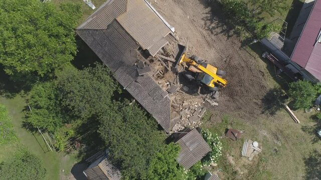 Destruction of an old private house. Aerial view.