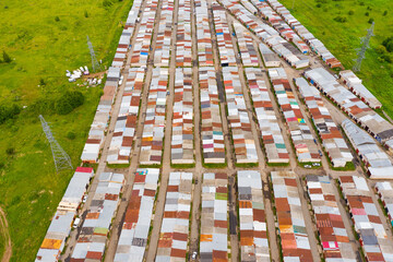 Obraz premium garages on the edge of the city, taken from above by a drone