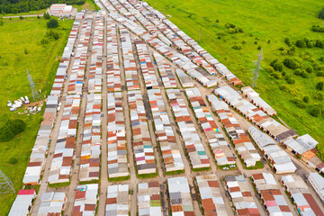 ramshackle shacks in a poor area taken from above by a drone