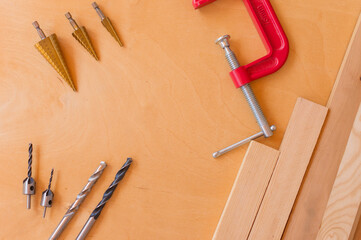 Flat lay of set of tools for concstruction works and home maintenance on wooden background. Top...