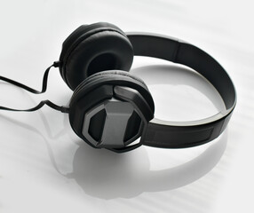 Headphones with wires on a white background