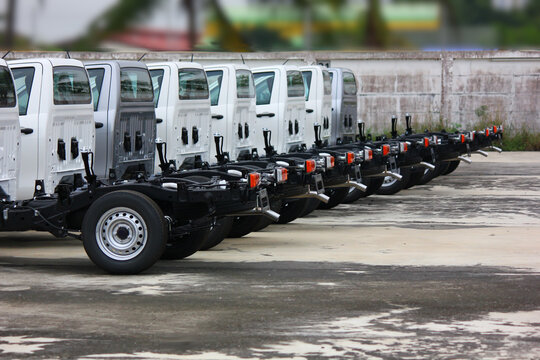 Group Of One Ton Truck Chassis In Stock Yard