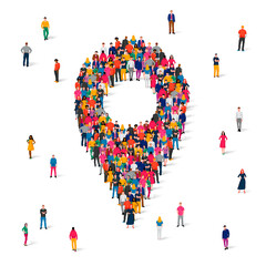 A large group of people in colorful clothes are standing in the form of a location marker on a map. Travel concept.