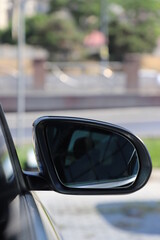 Rearview mirror on a modern car. Car side mirror.
