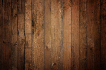 Dark old barn wood background texture. Vintage weathered rough planks backdrop.