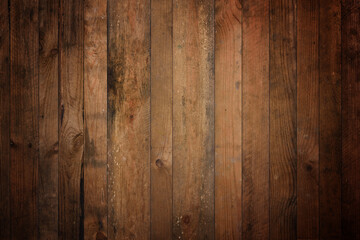Obraz premium Dark old barn wood background texture. Vintage weathered rough planks backdrop.