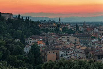 Fototapeta na wymiar Florence, Italy -20 June, 2019 : panorama of the city at twilight, view from Piazzale Michelangelo residential area at picturesque hill, old historical buildings. 