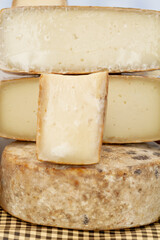 Stacked cured goat cheese, selective focus.