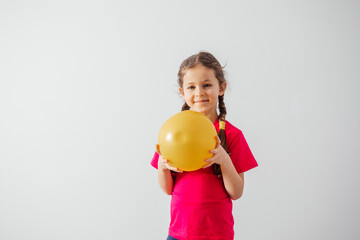 Adorble girl with sport ball prepared for sport