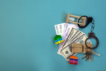 currency bills, model houses, bunch of keys, mousetrap, hourglass and handcuffs, late payments - liability under the law