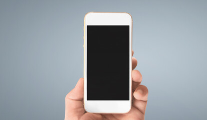 Hand holding smartphone device touching screen