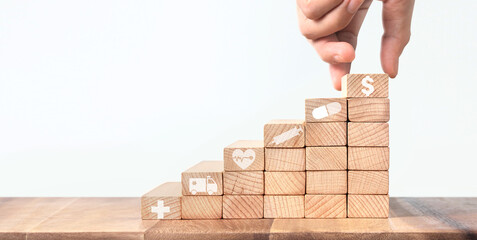 Wealth staircase concept.Toy wooden ladder healthcare And Medicine concept