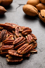 Close up heap of pecan on the black table