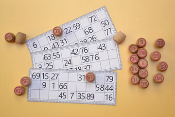 A lotto game with paper cards and barrels. An interesting puzzle board game.