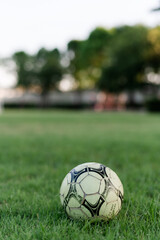Small soccer field in the park Along with soccer balls and small goals for the children to play in the evening.