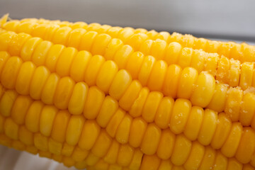 Yellow corn jam in a plate close-up. Hot Corn
