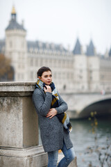 Fototapeta premium Beautiful girl walking in romantic paris