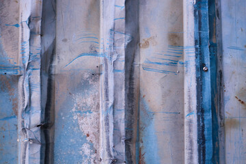 Texture from blue and white zinc wall.