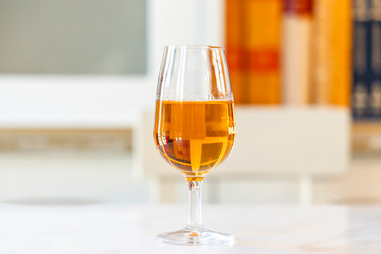 Sweet white Porto wine on the table.