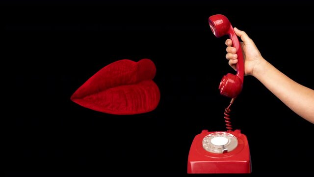 Lips talking on retro red telephone