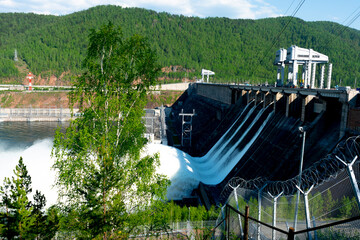 Discharge of water at a hydroelectric power plant.