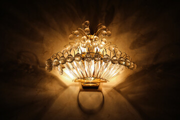 chandelier with golden light in intercontinental hotel Kabul Afghanistan - obrazy, fototapety, plakaty