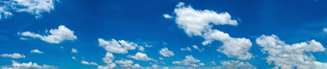 Naklejka na ściany i meble Panorama Blue sky and white clouds. Bfluffy cloud in the blue sky background.Vivid sky on white cloud.