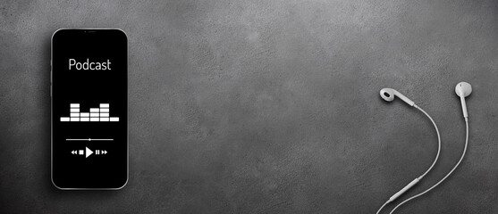 Podcast banner background with copy space. Smartphone screen displaying podcast app on grey concrete background with earphones - obrazy, fototapety, plakaty