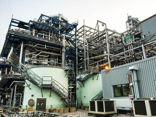 Heat recovery steam generator and sky in Combined-Cycle Co-Generation Power Plant which it so beautiful and popular to background power plant concept.