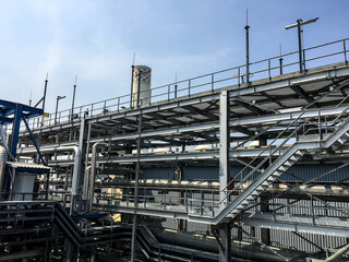 Heat recovery steam generator and sky in Combined-Cycle Co-Generation Power Plant which it so beautiful and popular to background power plant concept.