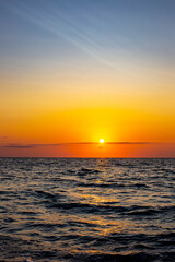 beautiful sunset at sea vertical photo