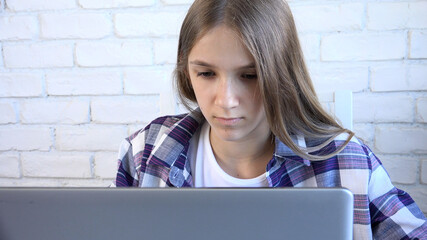 Kid Browsing Internet on Laptop, Child Studying Typing on Computer in Coronavirus Pandemic, Girl Learning, Online School Education