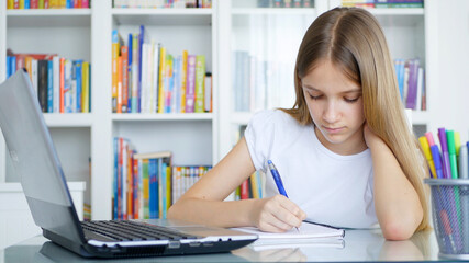Kid Using Laptop Studying, Child Learning, Writing at Home, Schoolgirl in Coronavirus Pandemic, Homeschooling, Online Education
