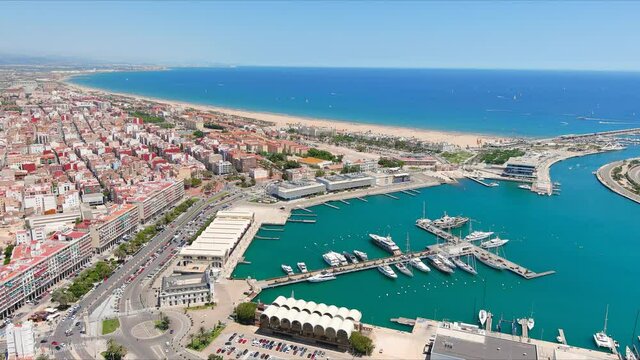 Valencia: Aerial view of famous city in Spain, city beaches (Platja del Cabanyal, Playa de la Malvarrosa and others), clear waters of Mediterranean Sea - landscape panorama of Europe from above