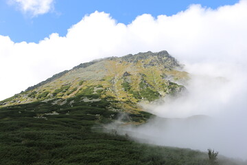 Fototapeta na wymiar Clouds in the mountains